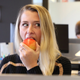 Illustration for article titled Crack Of Gunfire Resounding Through Office Gives Woman Perfect Cover She Needs To Bite Into Crisp Apple